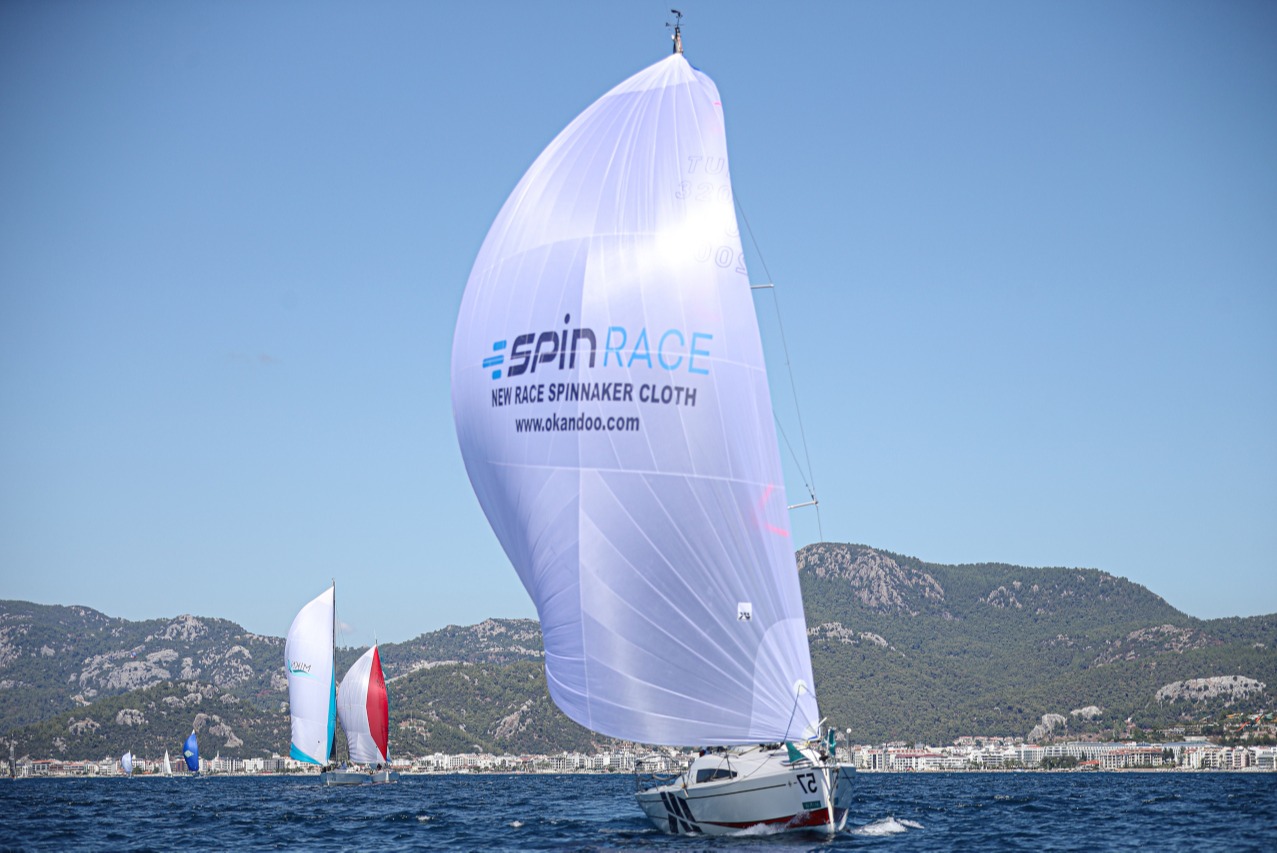 Boat sailing with spinnaker